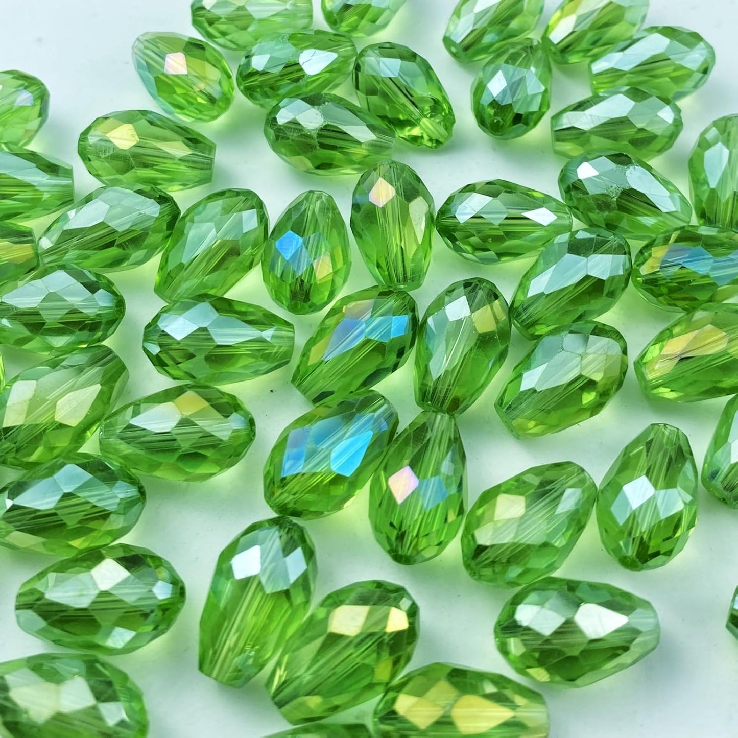 200pcs 4x6mm Teardrop Crystal Glass Beads Vertical Hole Faceted Glass Teardrop Spacer Beads for Bracelets Necklace Earring DIY Jewelry Making Craft(Light Green AB)