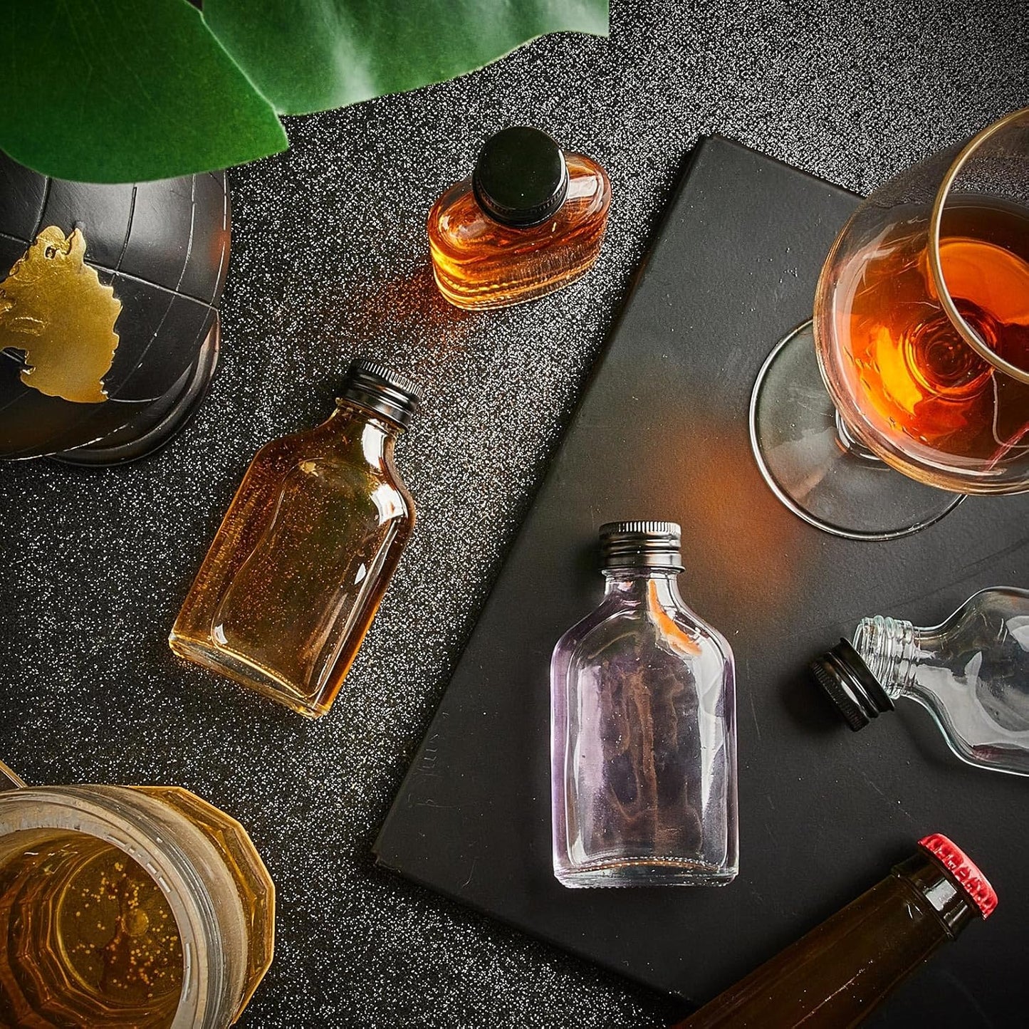 Patelai 16 Pcs Clear Glass Bottles with Caps Mini Glass Flask Liquor Bottles Empty Alcohol Shot Bottling Small Champagne Container DIY Gift for Wine Beverages Liquor Drinks Oil Beer (50 ml/ 1.7oz)